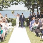 Kelsey and Jared walking down the aisle.