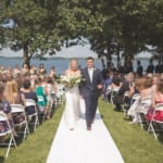 Kelsey and Jared walking down the aisle.