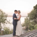 Kelsey and Jared posing on the railroad crossing.