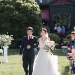 Xuan walking down the aisle.