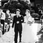 Xuan walking down the aisle.