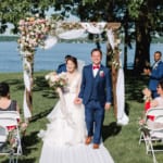 Xuan and Shu walking down the aisle.