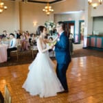 Bride and groom on dance floor.