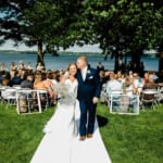 Liz and Bill walking down the aisle.