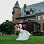 Liz and Bill kissing outside Belhurst.