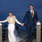 Caitlin & Chad posing on the dock.