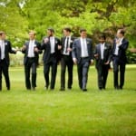 Matt and the groomsmen walking outside.