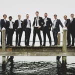 Matt and his groomsmen posing on the dock.