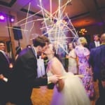 Lina and Matt kissing on the dance floor.