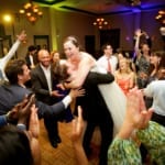 Lina and Matt dancing with friends and family.