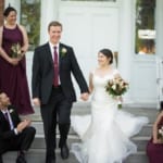 Melissa and Marcin standing outside Belhurst front door.