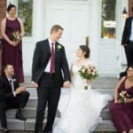 Melissa and Marcin standing outside Belhurst front door.