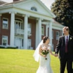 Melissa and Marcin walking outside Belhurst.