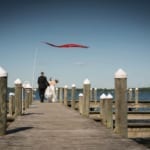 Melissa and Marcin walking on the dock.