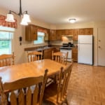 Dwyer Lane House - Dining table and kitchen.