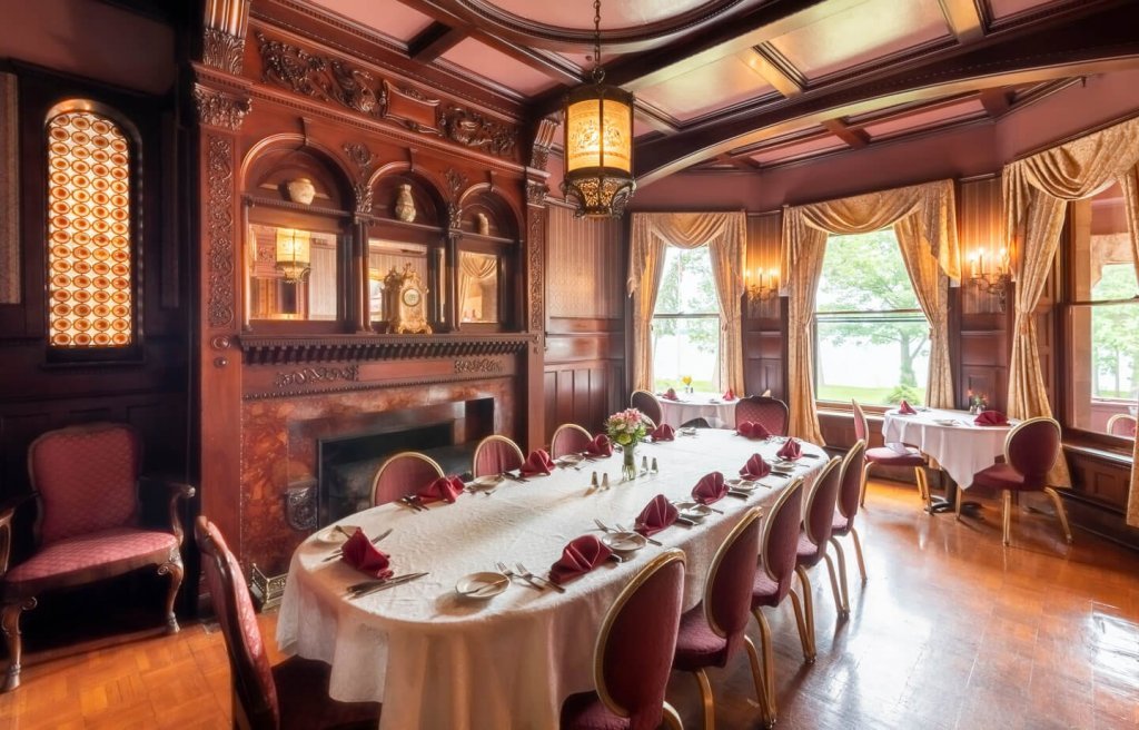 Elegant long dining table in The Library at Edgar's Steakhouse.