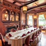 Elegant long dining table in The Library at Edgar's Steakhouse.