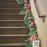 Floral decorations on stairs.