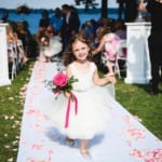 Flower girl walking down the aisle.