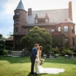 Haley and Matt kissing in front of Belhurst.