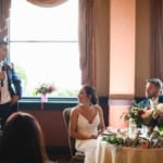 Haley and Matt listening to a groomsman's speech.