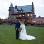 Caitlin & Chad posing outside Belhurst.