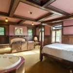 Lewis Suite - Room with bed, jacuzzi tub, fireplace and sitting area. Lewis Suite - Room with bed, jacuzzi tub, fireplace and sitting area.