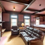 Lewis Suite - Room with bed, fireplace and sitting area. Lewis Suite - Room with bed, fireplace and sitting area.
