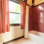 Lewis Suite - bathroom with bath/shower. Lewis Suite - bathroom with bath/shower.
