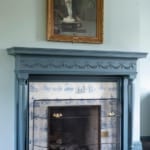 Nicholas Room - Fireplace with painting above.