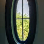 Nicholas Room - Oval window. Nicholas Room - Oval window.