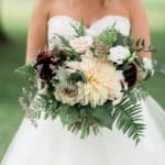 Shannon holding her wedding bouquet.