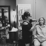 Bridesmaid getting makeup done.