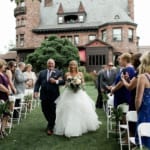 Shannon walking down the aisle with her father.