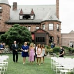 Guests walking to the ceremony seating.