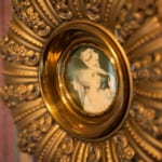 Young Room - framed painting of a woman.