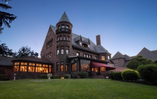 Photo of Belhurst Castle at Dusk. It's One of the Best Romantic Getaways in Upstate New York.