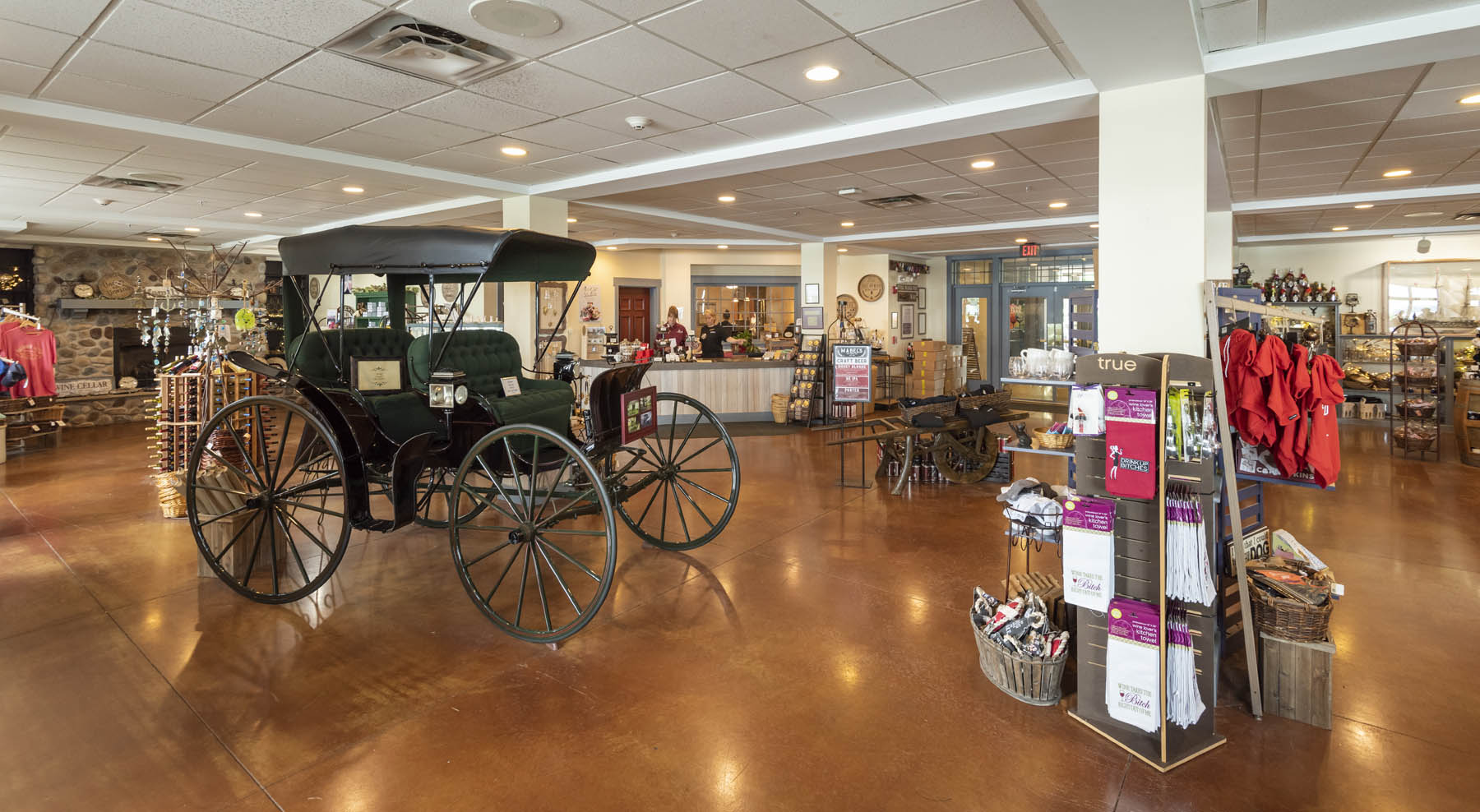 Belhurst gift shop with old carriage as centerpiece.
